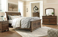 Flynnter Queen Panel Bed with 2 Storage Drawers with Mirrored Dresser, Chest and Nightstand Factory Furniture Mattress & More - Online or In-Store at our Phillipsburg Location Serving Dayton, Eaton, and Greenville. Shop Now.